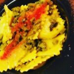 Ravioli con asparagi e polvere di pomodoro
