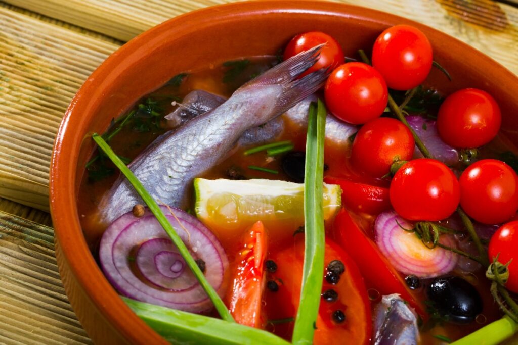 Galleria foto 'Nasello alla Cipolla con Pomodorini' - foto 1