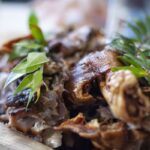 Porceddu sardo: ricetta tradizionale del maialino arrosto al mirto