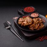 Alette di pollo piccanti glassate al miele